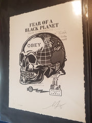 Title: Skull of a Black Planet Letterpress  Artist: Shepard Fairey obey Giant store 2016  Edition: xx/450  Type: Letterpress Screen Printed Poster  Size: 10" x 13"  Notes:  Signed and numbered by the artist.  Check out our other listings for more hard-to-find and out-of-print posters.