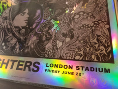 Title: Foo Fighters FOIL VARIANT London Stadium  Artist: Richey Beckett  Edition: Limited edition of 25 AP's, signed by the artist, numbered and embossed  Type: beautifully silk screen printed, 'rainbow foil' stock, including metallic silver ink  Size: 24" x 18"  Venue: London Stadium  Location: England, UK  Notes: Masterfully hand pulled by Prints Of Thieves in England, UK.  **Small blemish on bottom corner, See photos.**  Ready to ship!