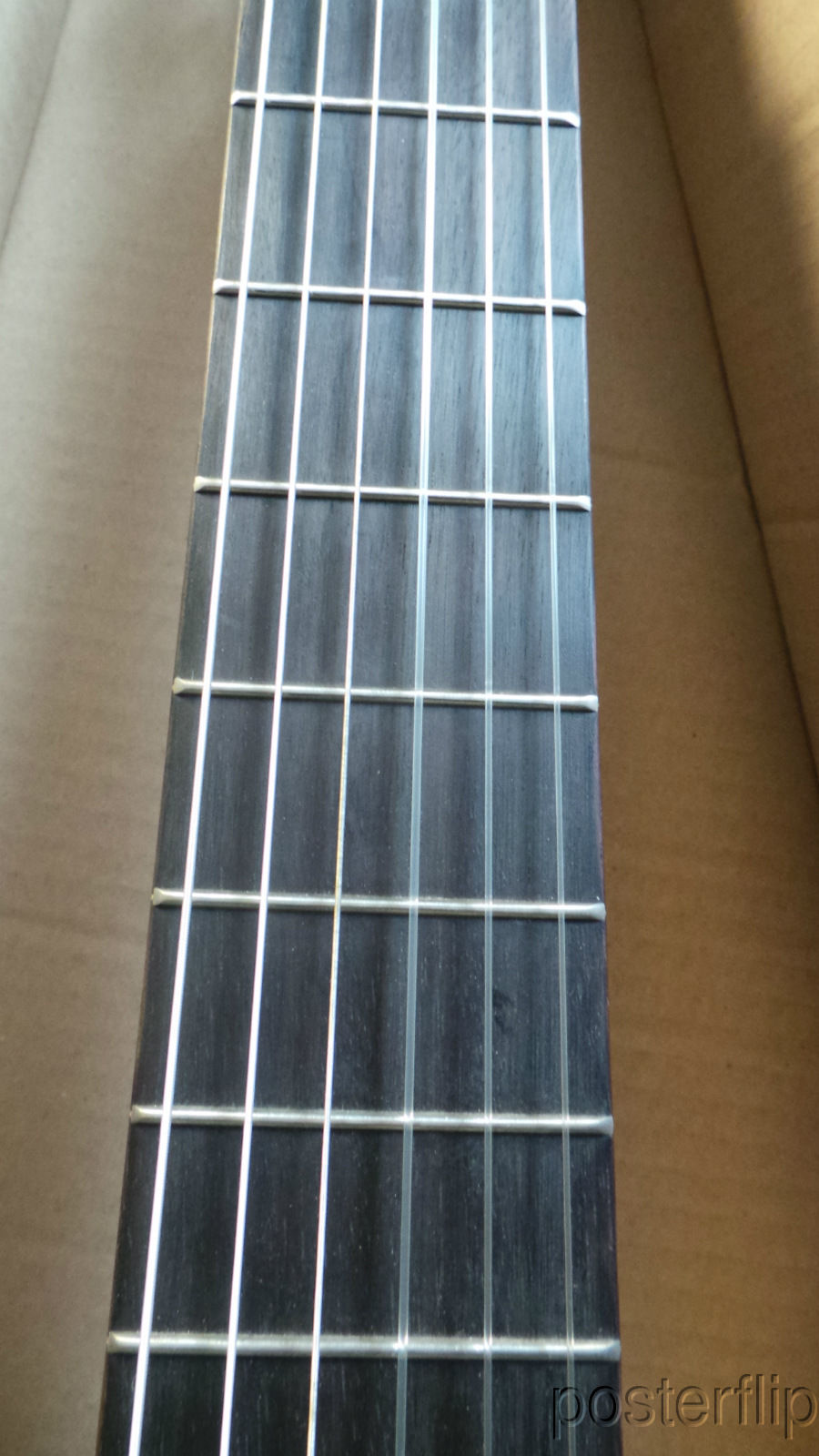 Yamaha nylon-string acoustic guitar autographed by acoustic guitar duo Rodrigo y Gabriela.