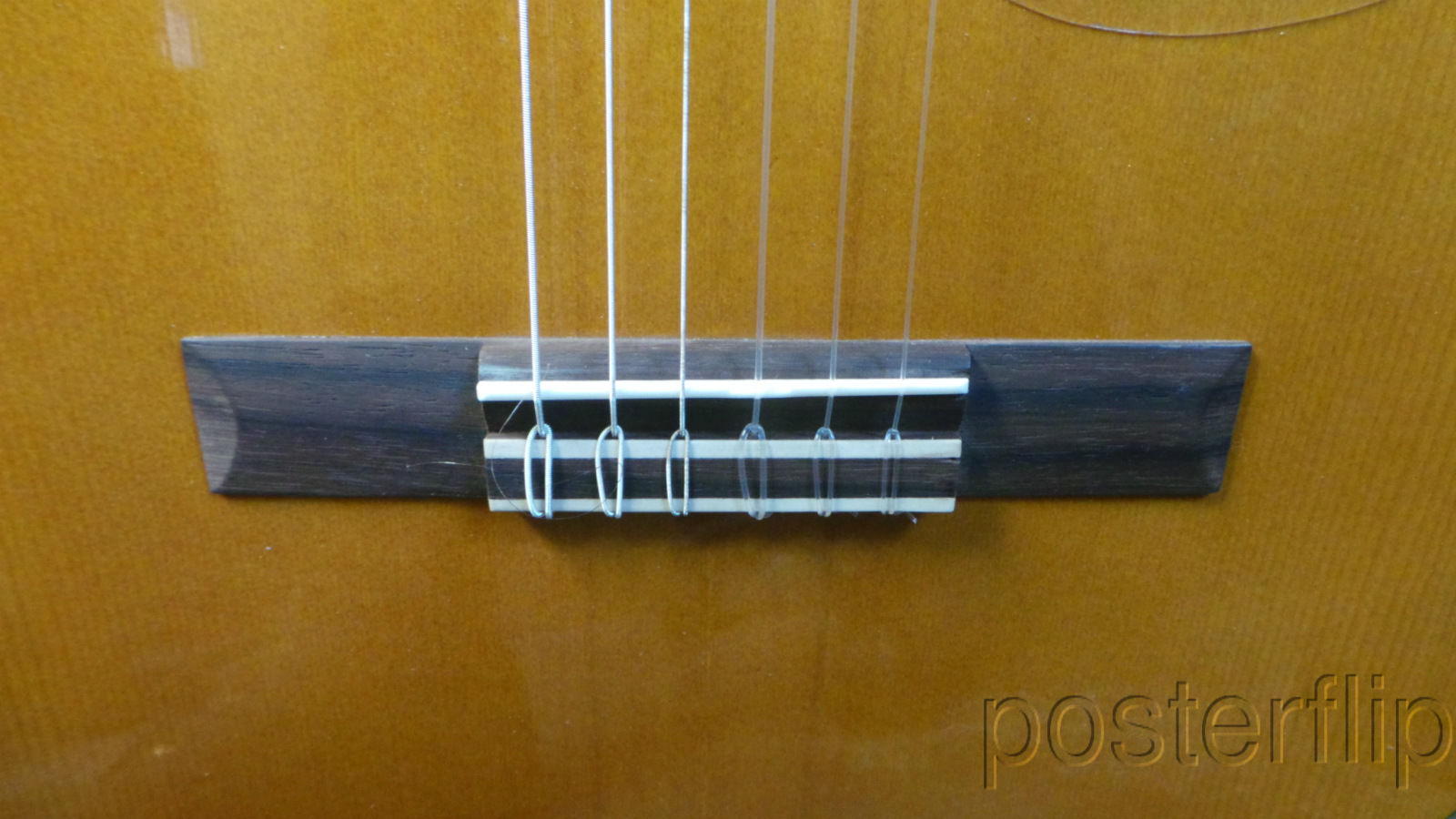 Yamaha nylon-string acoustic guitar autographed by acoustic guitar duo Rodrigo y Gabriela.