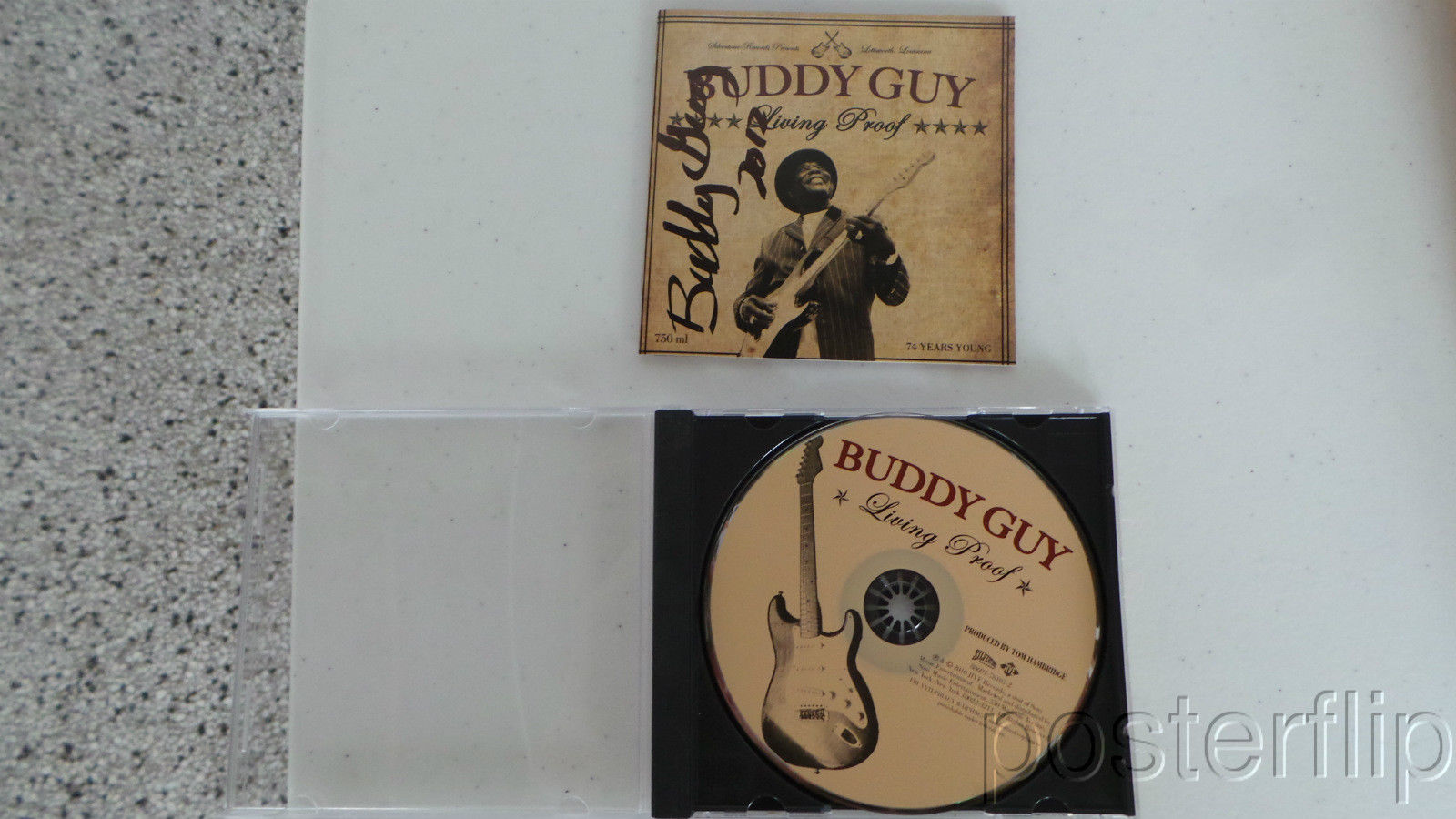 Notes:  Buddy Guy Living Proof Autographed CD Booklet + CD  You are purchasing a CD with autographed booklet.  Cd is from 2010 and was signed by Buddy Guy.  Buyer will receive the CD case, the CD and the autographed booklet.  Everything pictured will be included.  Item is in very good condition.  Please see photos for details.