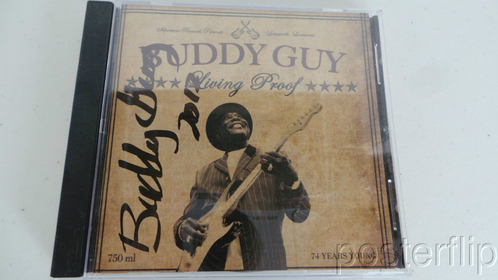 Notes:  Buddy Guy Living Proof Autographed CD Booklet + CD  You are purchasing a CD with autographed booklet.  Cd is from 2010 and was signed by Buddy Guy.  Buyer will receive the CD case, the CD and the autographed booklet.  Everything pictured will be included.  Item is in very good condition.  Please see photos for details.