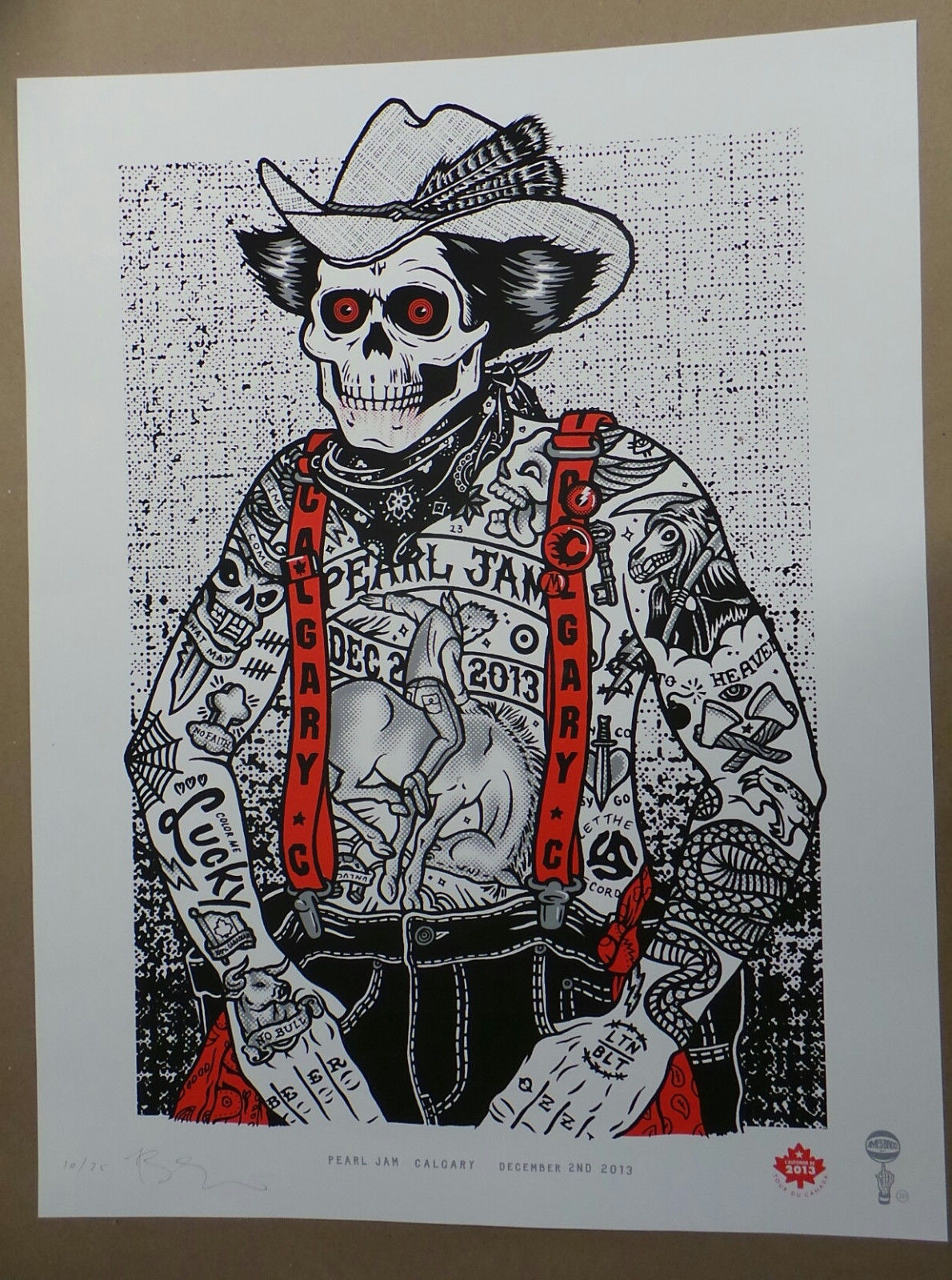 Title:  Pearl Jam Calgary - 2013 (Bonez Limited Edition)  Artist:  Ames Bros  Edition: Poster is printed in a Bonez Limited Edition of 25. Signed and numbered by the artist.  Type:  Screen Print  Size: 20" x 26"  Location:  Calgary, Australia