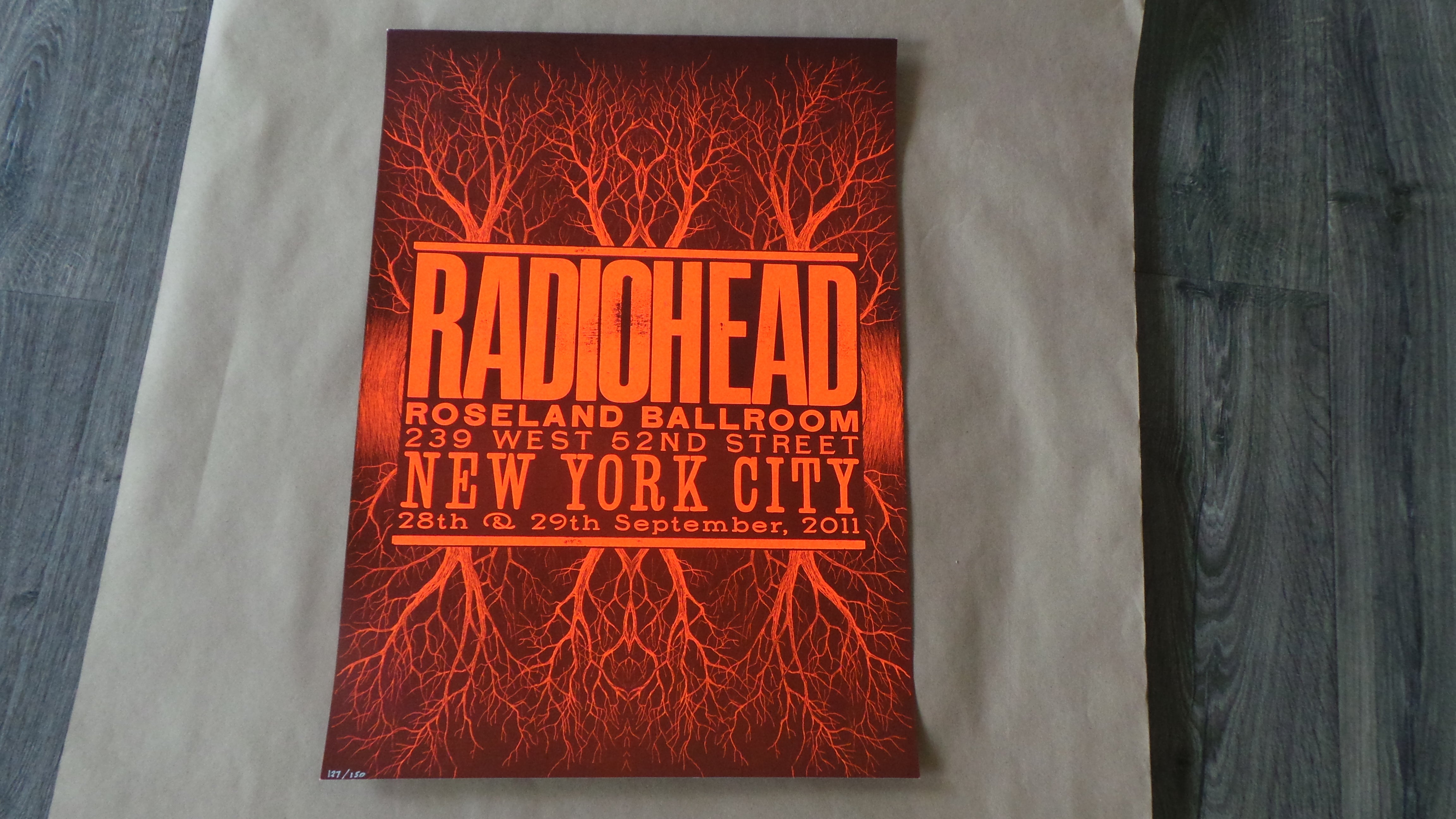 Title: Radiohead (Roseland Ballroom NYC 2011, Blood Orange)  Artist: Stanley Donwood  Edition:  xx/150  Type: Screen print poster  Size: 16.5" x 23.5"  Location: New York City, NY  Venue: Roseland Ballroom  Notes: Created for the band's shows on 9/28-9/29/11 at the Roseland Ballroom in New York City.  Released in limited edition of 150 signed and hand numbered by the artist.