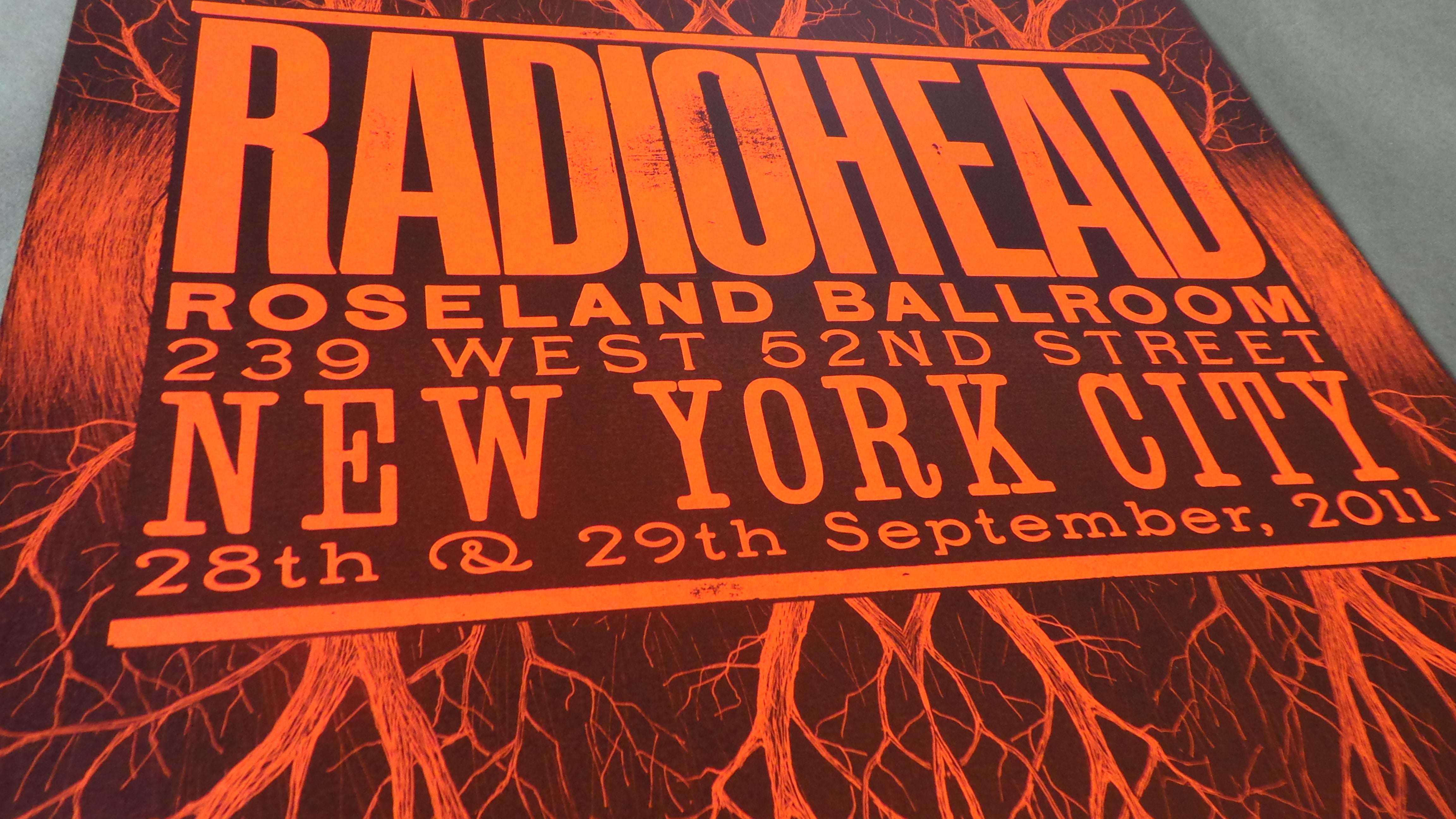 Title: Radiohead (Roseland Ballroom NYC 2011, Blood Orange)  Artist: Stanley Donwood  Edition:  xx/150  Type: Screen print poster  Size: 16.5" x 23.5"  Location: New York City, NY  Venue: Roseland Ballroom  Notes: Created for the band's shows on 9/28-9/29/11 at the Roseland Ballroom in New York City.  Released in limited edition of 150 signed and hand numbered by the artist.