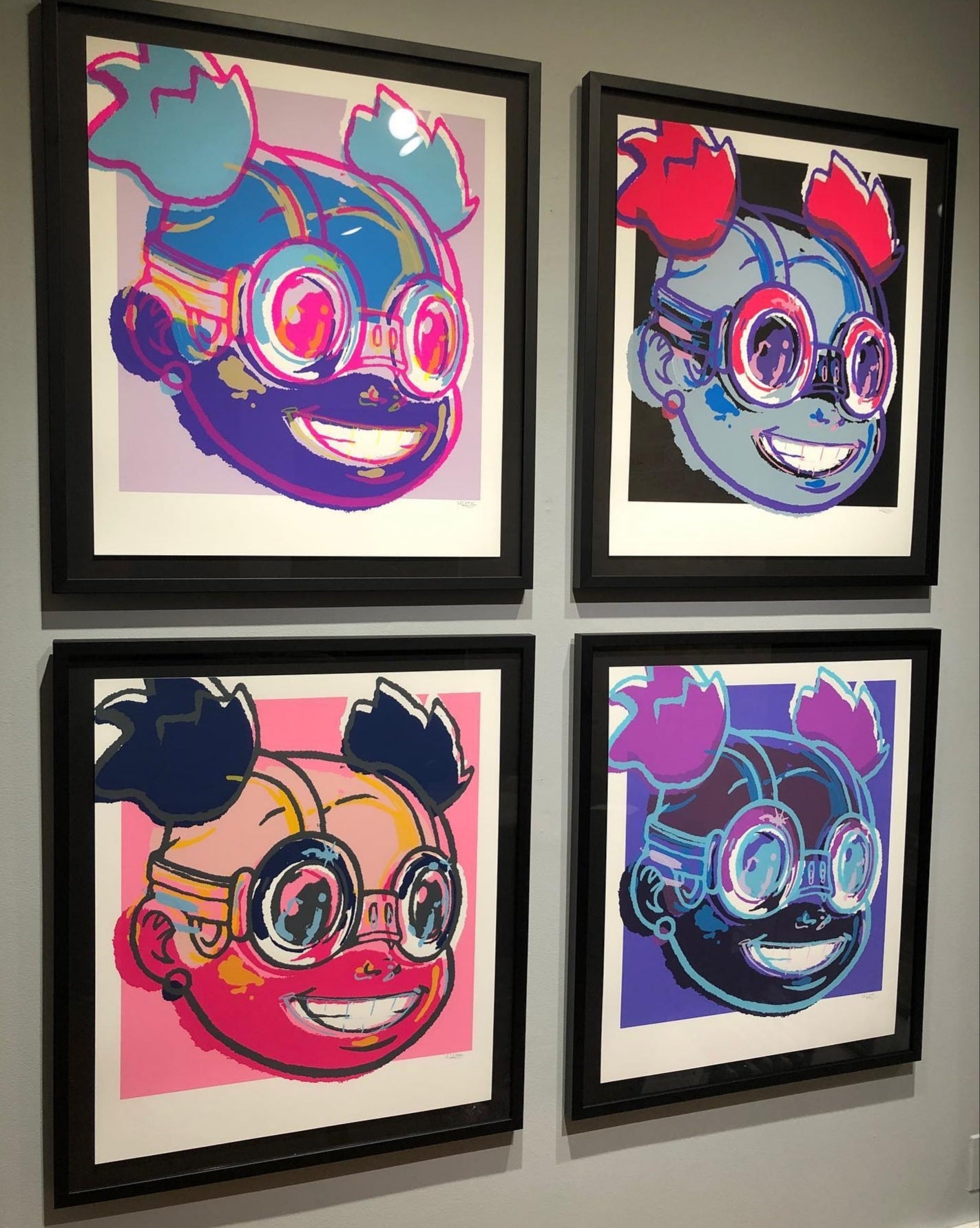 Title: "LILAC – Pink, Purple, Turquoise, Blue" Poster artist: Hebru Brantley Edition: xx/25 plus 5 A/P sets Type: Screen Print Size: 24" x 28"  Notes: Portfolio Edition of 25 plus 5 A/P sets  Includes four 24" x 28"  Prints come in a custom made portfolio box embossed with "LILAC: HEBRU BRANTLEY"  Each print is signed and numbered by Hebru Brantley.  Printed by POP!NK Editions for Vertical Gallery – 2020.