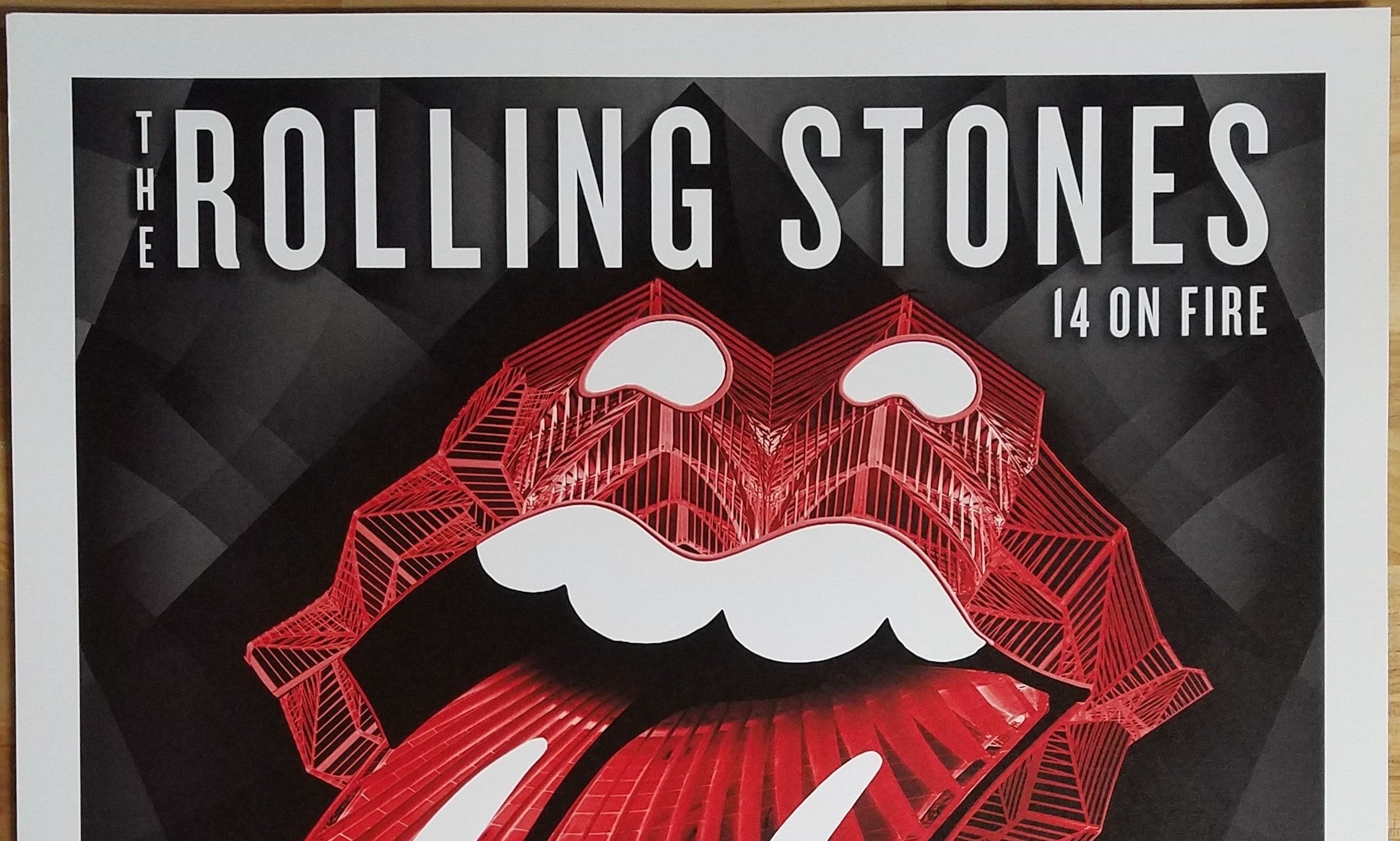 Title: Rolling Stones  - 2014 OFFICIAL POSTER LISBON #2 ROCK IN RIO  Poster artist:   Edition:  xx/500  Type: Limited edition lithograph   Size: 17" x 23"  Location: Lisbon, Portugal   Venue:  Rock in Rio Festival   Notes:  1st edition, official poster hand numbered and embossed.  Official poster, Europe 14 On Fire Tour original from the show!