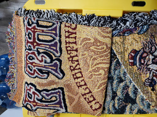 The Golden Road Woven Blanket featuring the art of Mike Dubois. Measures 53" x 69"  Care Instructions : Machine Wash Cold, Front Load Commercial washer, Mild Detergent or hand wash Mild detergent. Tumble low or Dry clean.