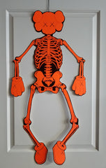 KAWS Skeleton Cardboard Wall Hanging - Orange