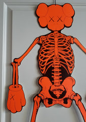 KAWS Skeleton Cardboard Wall Hanging - Orange