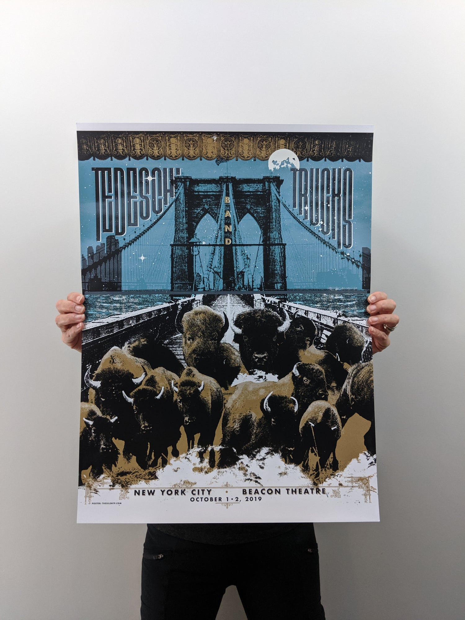 Title: Tedeschi Trucks Band - NYC - 2019 (Full triptych sets available)  Edition: Limited Edition, Signed and numbered APs.  Type:  Five color limited edition triptych is printed full bleed so that all three posters can be framed/hung together as shown in the image.  Gold metallic and glow in the dark ink add special print touches  Size: Full triptych size: 54” x 24”  Individual poster size: 18” x 24”  Notes:  **THESE PRINTS ALL SOLD OUT IN NEW YORK**