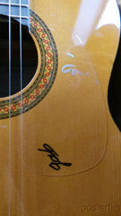 Yamaha nylon-string acoustic guitar autographed by acoustic guitar duo Rodrigo y Gabriela.