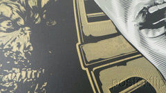 "Army of Darkness Gold Variant" by Jeff Boyes.  Inspired by the popular cult film. Released by Skuzzles in 2014 in limited edition of 50 prints. Print is stored flat in very good condition. Following purchase, prints are rolled in archival paper and shipped with bubble wrap in sturdy cardboard tubes.
